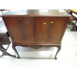 A mid 20th Century mahogany drinks cabinet