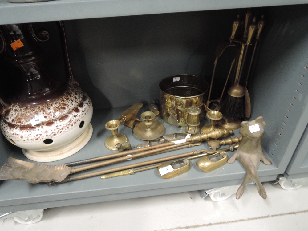 A selection of vintage brass wares including fire side companion