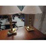 A pair of modern brass table lamps of similar style but smaller proportions to lot 492