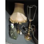 A selection of vintage table lights and lamps including slate and brass