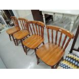 Four traditional pine kitchen chairs