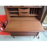 A vintage sapele bureau