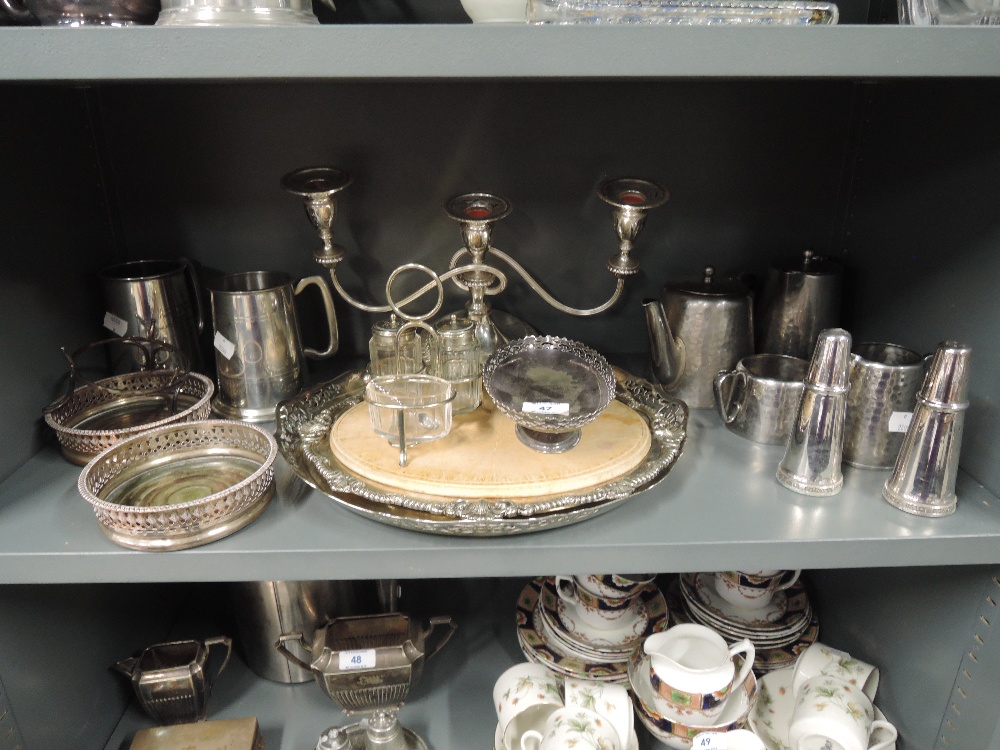 A selection of vintage metal table wares including tea set and trays