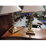 A pair of modern brass table lamps