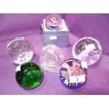 A selection of vintage glass paper weights and dumps