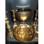 A selection of vintage brass wares including candle sticks