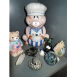 A selection of vintage decorations and figures including biscuit barrel