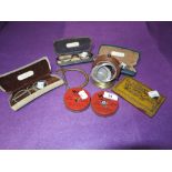 A selection of vintage hardware items and selection of spectacle glasses