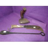 A selection of vintage craft tools including WJ branding iron and one handed stirrup Adze