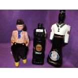 A selection of vintage figural advertising spirit decanters including Barbados Rum and Cossack