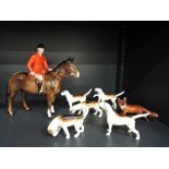 A Beswick study, Huntsman (af) along with six Beswick studies, foxhounds and fox (four af)