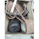 A selection of vintage cast iron cooking pans and pots