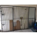 A Dog cage front with barred door 3.07m x 2.1m ideal for internal or external use. (this item is not