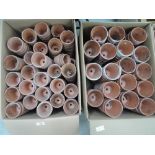 Two boxes of hand thrown terracotta plant pots