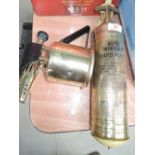A vintage brass Minimax fire extinguisher and Monitor blow torch