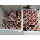 Two boxes of hand thrown terracotta plant pots