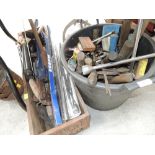 A large bucket of workshop tools sockets, spider wrench etc