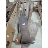 A selection of vintage peat spades and cutter