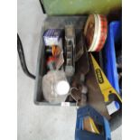 A box of various saws, screw etc
