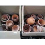 Two boxes of hand thrown terracotta plant pots