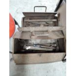 A selection of vintage garage and workshop tools and metal chests