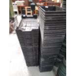 Two stacks of seed trays