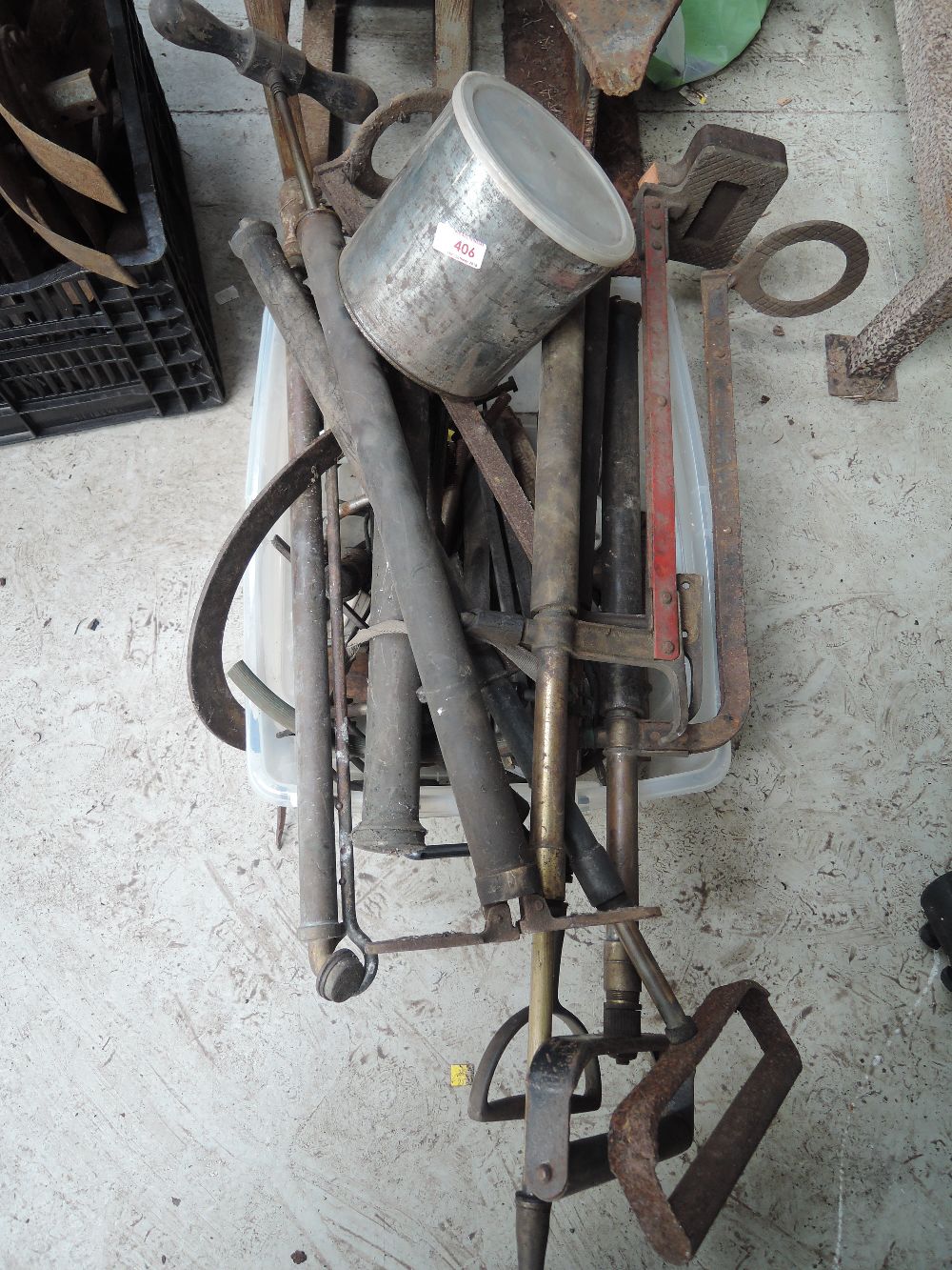 A selection of vintage stirrup pumps and similar