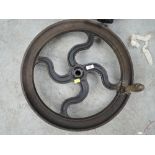 A large cast iron wheel