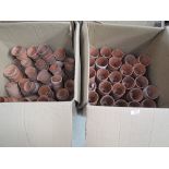 Two boxes of hand thrown terracotta plant pots