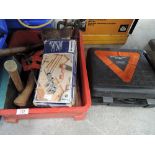 A box of various workshop tools