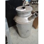 A vintage dairy container with spout