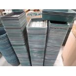 Three stacks of polypropylene seed trays