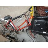 A vintage Royal mail postal bike with parcel box