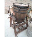 A vintage butter churn and stand local Kendal makers