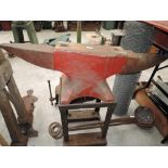 A vintage blacksmiths anvil and heavy duty stand