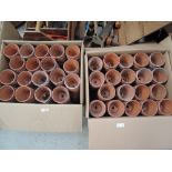 Two boxes of hand thrown terracotta plant pots