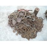 A large amount of chain, block and tackle weights etc
