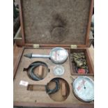 A vintage compression gauge and engine tester by Wayne Myers co