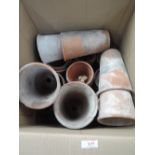 A box of large hand thrown terracotta plant pots