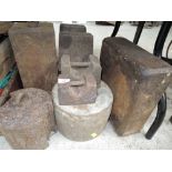 A selection of vintage very heavy cast weights and similar