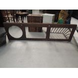 A vintage cast hay rack and trough holder