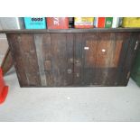 A vintage tool cupboard with original contents