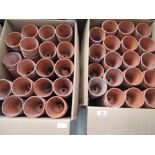 Two boxes of hand thrown terracotta plant pots