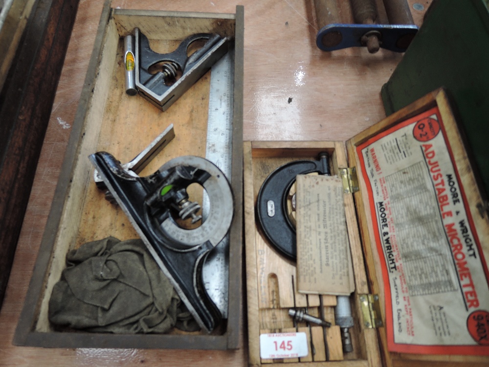 A selection of vintage measuring devices including Moore and Wright micrometer