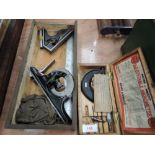 A selection of vintage measuring devices including Moore and Wright micrometer