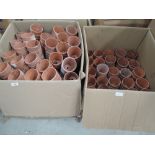 Two boxes of hand thrown terracotta pots