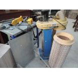 A vintage machine shop table saw and extractor unit