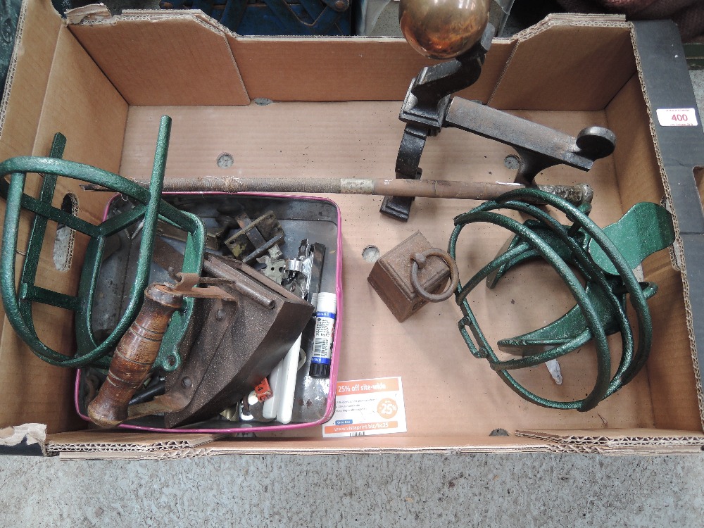 A selection of vintage assorted hardware including stove iron and HM whip handle