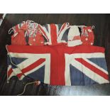 A selection of vintage common wealth and British flags and bunting