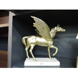 A vintage brass cast mythical Pegasus horse figure with marble style plinth